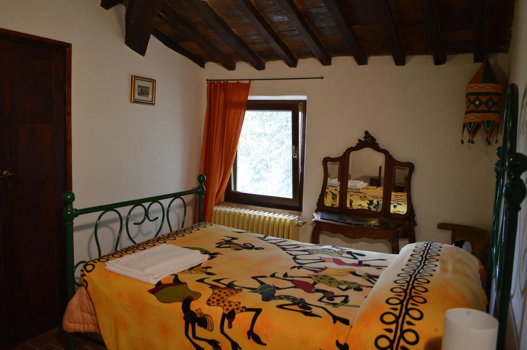 Agri-Bio Podere Santa Palmira Помаранче Стая снимка